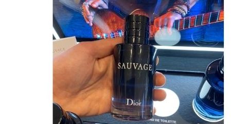 Dior Sauvage Bottle in hand