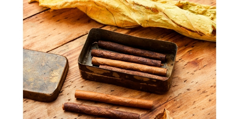 cigarillos and tobacco leaf