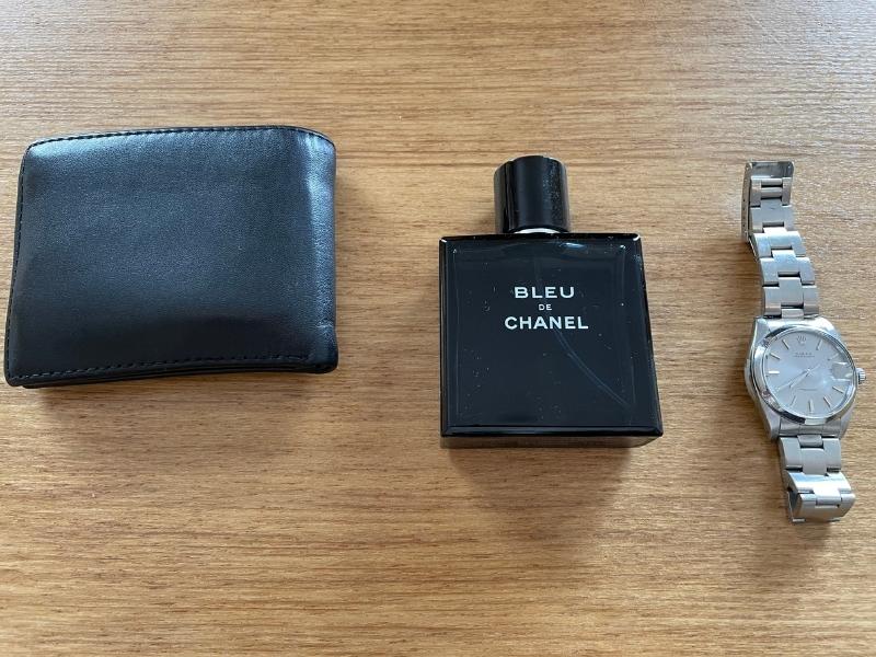 bleu de chanel with wallet and rolex watch for scale