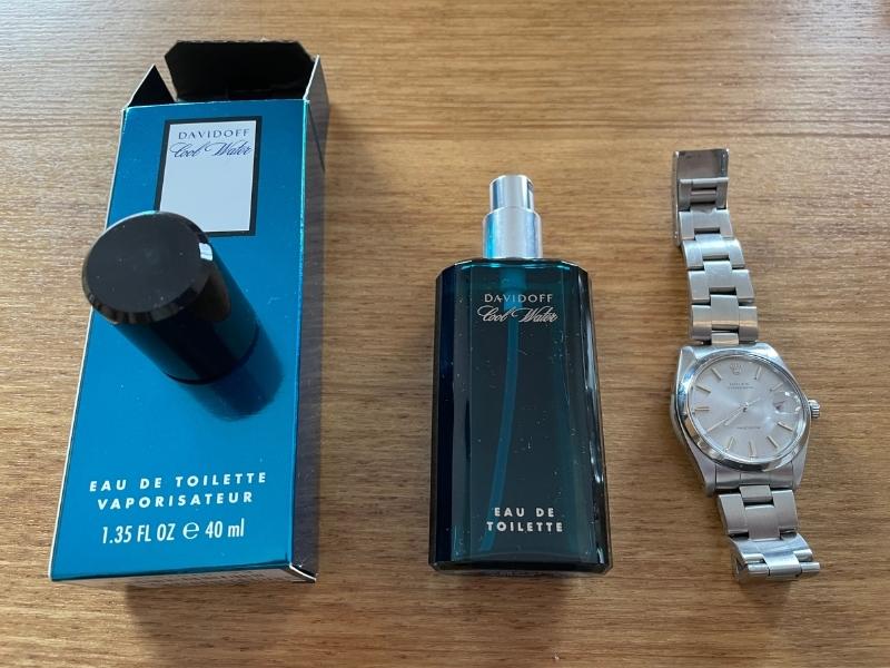 davidoff cool water bottle and box with rolex for scale