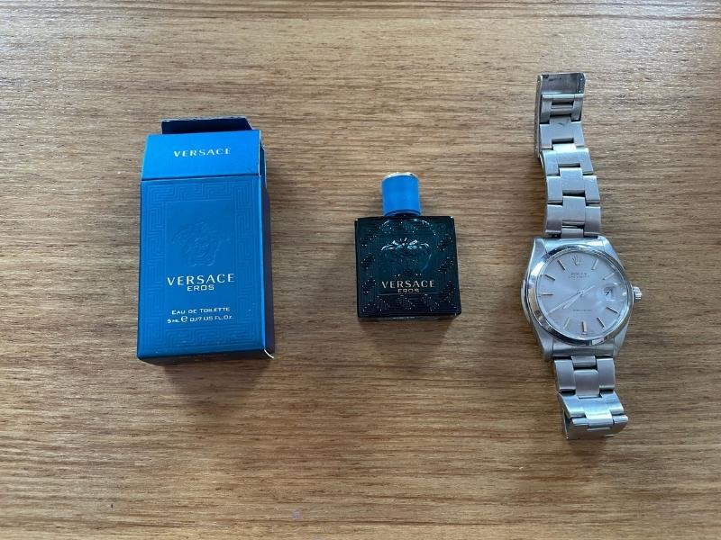 versace eros with open box and watch for scale