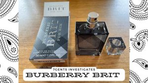burberry brit opened bottle next to box on a paisley background
