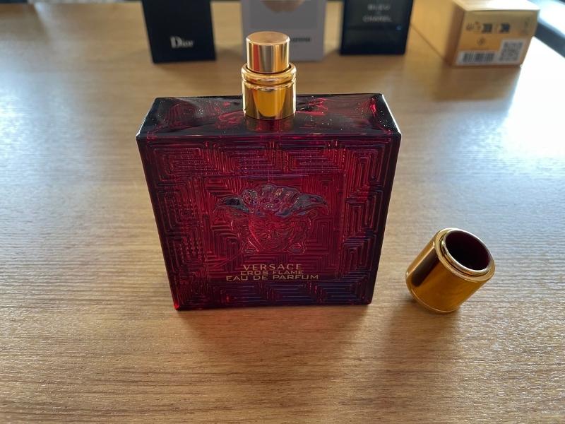 versace eros flame, opened with cap to the side